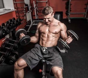 Man training and having a hard workout while on anabolic diet
